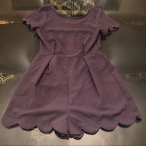 Grey Romper with scalloped sleeves